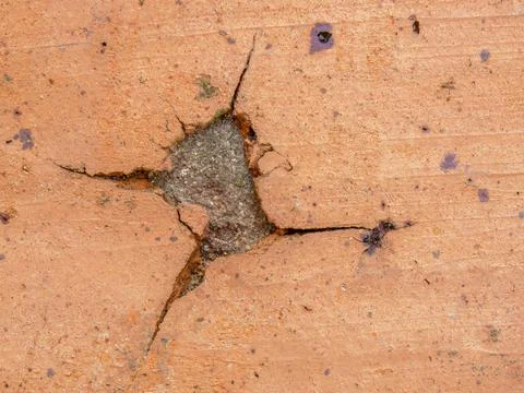 Cracks and marks on rustic clay floor tiles Stock Photos