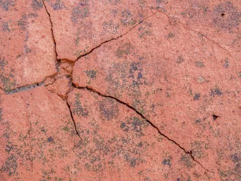 Cracks and marks on rustic clay floor tiles 스톡 사진