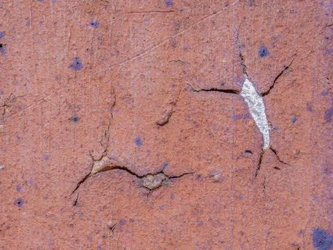 Cracks and marks on rustic clay floor tiles Фото