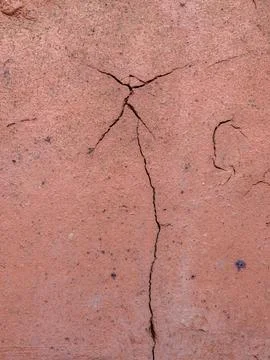 Cracks and marks on rustic clay floor tiles Fotos Stock