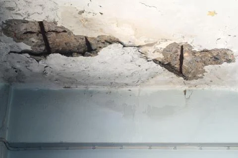 Cracks in Ceiling texture are the danger Stock Photos