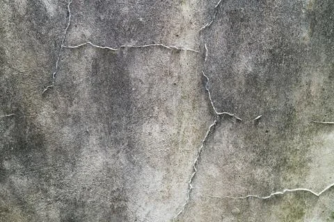 Cracks in a Decayed Dark Wall with Distressed Texture, Dark Horror Texture Foto stock