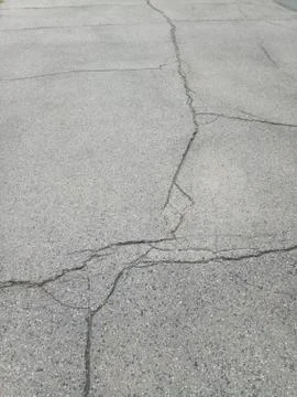 Cracks on dry pavement Stock Photos