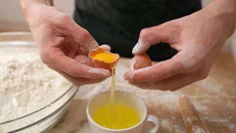 Cracks An Egg Cook Stock Footage 273500024