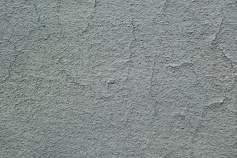 Cracks in the facade of the house Stock Photos