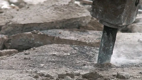 Cracks on the floor from the work of a jackhammer, close up Video stock 82309307