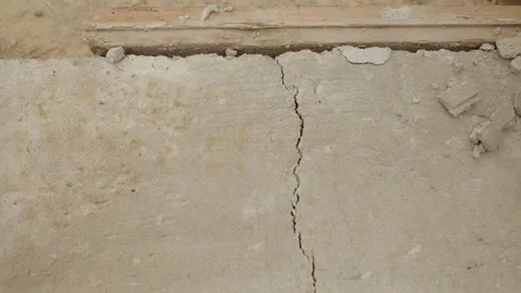Cracks forming in concrete during drying process in house construction site Stock Footage 324662509