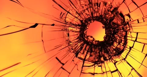 Cracks in the glass on the background of fire Stock Footage 220740033