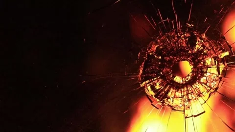 Cracks in the glass on the background of fire Stock Footage 220740729