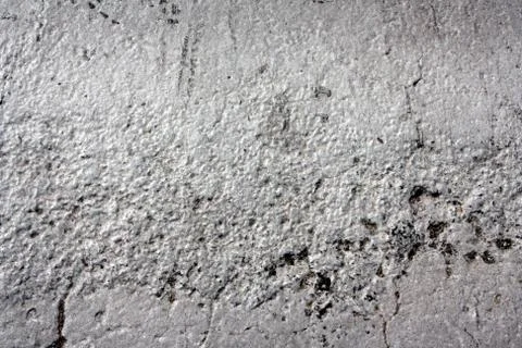 Cracks in the gray concrete wall Stock Photos