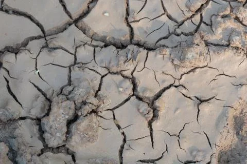 Cracks in ground, texture background, no water without rain Stock Photos