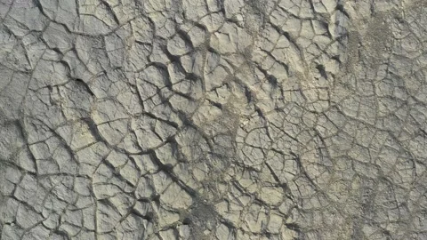Cracks in the ground where global warming and drought can be seen on mountain Stock Footage 171597610