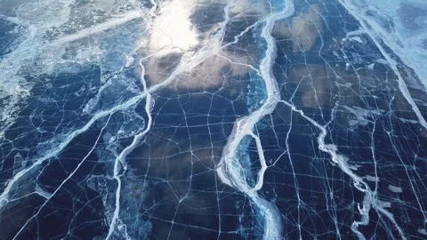 Cracks in ice from aerial view. Winter in Siberia, Baikal Lake. Stock Footage 105507538