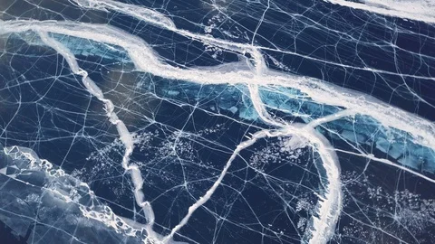 Cracks in ice from aerial view. Winter in Siberia, Baikal Lake. Stock Footage 105507578