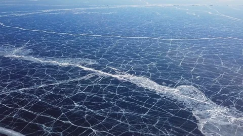 Cracks in ice from aerial view. Winter in Siberia, Baikal Lake. Stock Footage 105507643