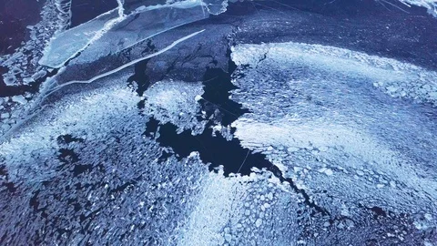 Cracks in ice from aerial view. Winter in Siberia, Baikal Lake. Stock Footage 105508049