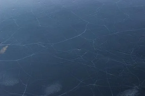 Cracks in ice on a lake textures Stock Photos