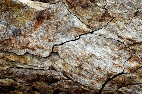 Cracks on the rock of the block Stock Photos
