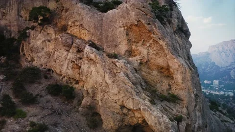 Cracks in the rock in the rays of the setting sun, Crimea. Drone aerial shot. Stock Footage 220632761