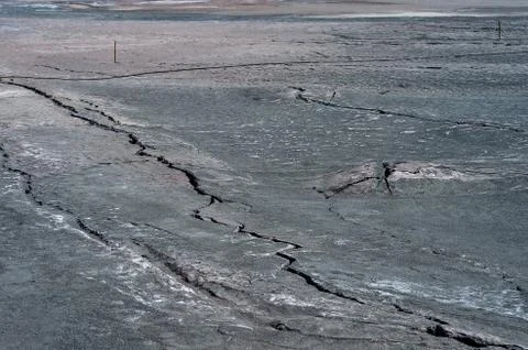 Cracks on the surface of dry land Stock Photos
