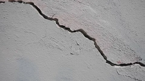 Cracks on wall show damage in building structure Stock Footage 335798736