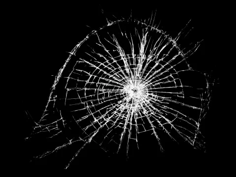 Cracks on the windshield glass of the car. Texture concept on black backgroun Stock Illustration