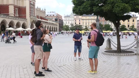 Cracow. Tour guide talking to group of tourists. Stock Footage 160206792
