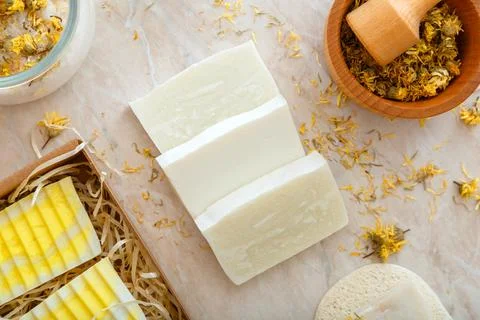 Craft artisan soap bars with herbs dried flowers. Natural bath products with  Stock Photos