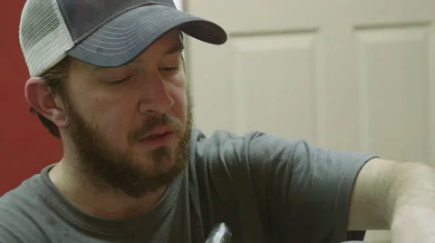 Craft Beer Brewer Working Over Large Brew Kettle at Brewery Vídeo Stock 61502224