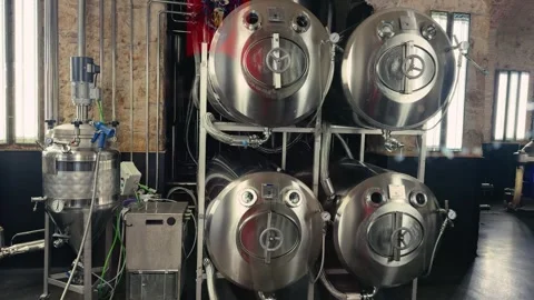 Craft beer fermentation tanks at the manufacturing facility. Stock Footage 318007268
