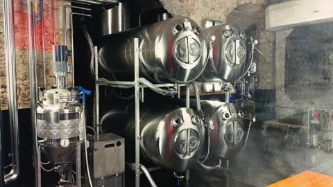 Craft beer fermentation tanks at the manufacturing facility. Stock Footage 320560974