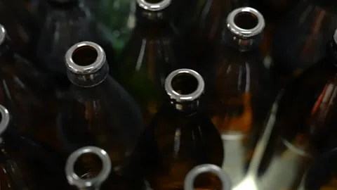 Craft beer production. Conveyor with empty bottles. Stock Footage 256181591