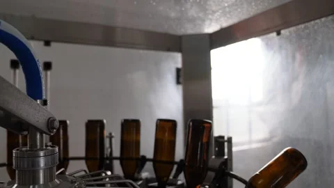 Craft beer production. Conveyor with empty bottles. Stock Footage 256181955