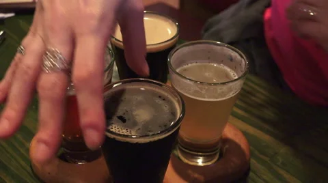 Craft Beer Sample Flight On Wooden Paddle At Bar 02 Stock Footage 52463832