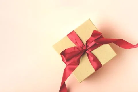 A craft box on the pink background. Stock Photos