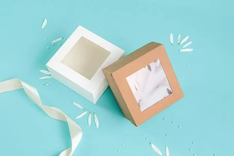 Craft boxes on a festive blue background. Top view. Place for text and logo.. Foto stock