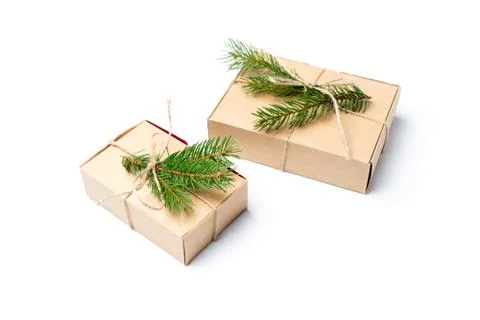 Craft boxes with pine tree branch isolated on white Stock Photos