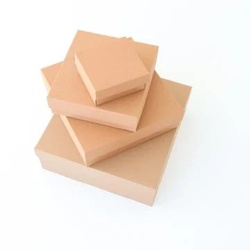 Craft boxes on a white background are stacked on top of each other. Place f.. Foto stock
