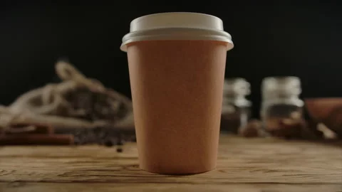 Craft disposable cup for hot drinks presentation. Tea, coffee for take away Stock Footage 140364868