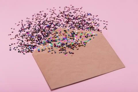 Craft envelope on a pink background Foto stock