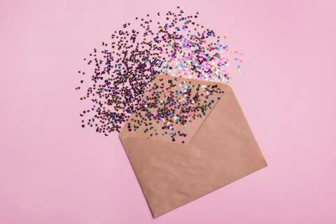 Craft envelope on a pink background Stock Photos