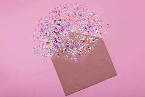 Craft envelope on a pink background Stock Photos