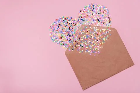 Craft envelope on a pink background Stock Photos