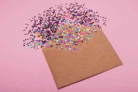 Craft envelope on a pink background Stock Photos