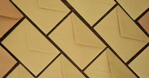 Craft envelopes for letters pattern on a wooden brown table Stock Footage 345632259