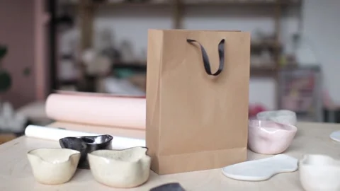 Craft gift bag and interior ceramics Stock Footage 107311506