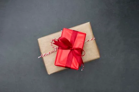 Craft gift boxes over dark background. Christmas mock up with copy space. Win Foto stock
