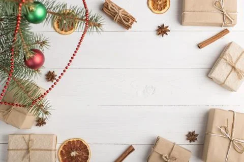 Craft gifts under the tree, on the table, against the white background. The c Stock Photos