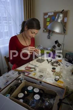 Craft Jeweller At Workbench