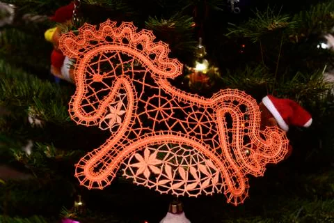 Craft lace souvenir on the Christmas tree Stock Photos